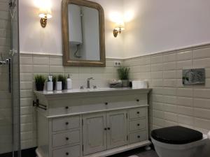 Ένα μπάνιο στο FORUM Apartment I and II +40 φωτογραφίες