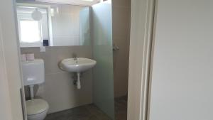 Kúpeľňa v ubytovaní Apartman Nóra