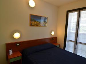 Ένα ή περισσότερα κρεβάτια σε δωμάτιο στο Resort in Lido di Spina near Adriatic Coast +32 φωτογραφίες