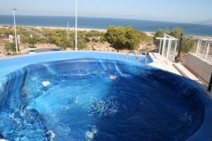 Bazén v ubytování Nova Beach Paradise Apartment nebo v jeho okolí