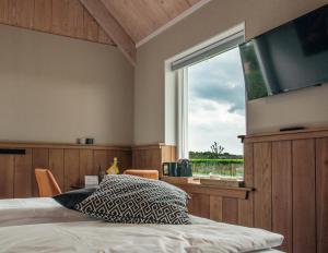 TV tai viihdekeskus majoituspaikassa Bed & Breakfast Bed in Brabant Veghel