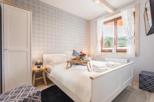 Posteľ alebo postele v izbe v ubytovaní Apartamenty Rockus LUX & SPA Zakopane