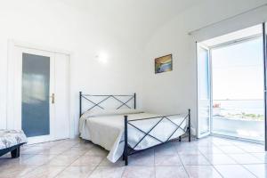 Posteľ alebo postele v izbe v ubytovaní La Panoramica