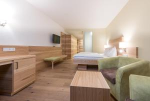 Telewizja i/lub zestaw kina domowego w obiekcie Hotel Leonhard