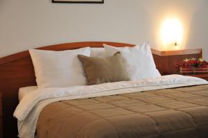 Letto o letti in una camera di Hotel Terex