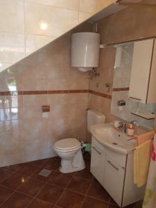 Koupelna v ubytování Apartmani Božana Viganj