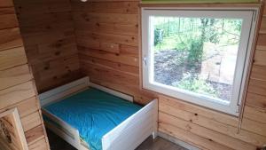 Postel nebo postele na pokoji v ubytování La cabane de Denier