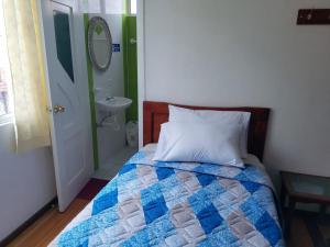 Postel nebo postele na pokoji v ubytování Hotel Ventura