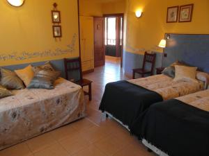 Posteľ alebo postele v izbe v ubytovaní La Casa del Filandón- HOTEL RURAL