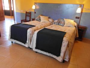 Posteľ alebo postele v izbe v ubytovaní La Casa del Filandón- HOTEL RURAL