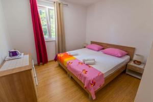 Postel nebo postele na pokoji v ubytování Rooms Karla