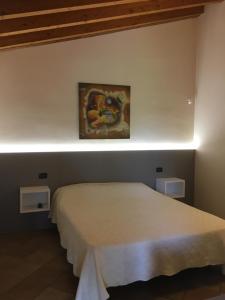Postel nebo postele na pokoji v ubytování Villa Pasini