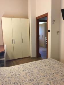 Postel nebo postele na pokoji v ubytování Villa Pasini