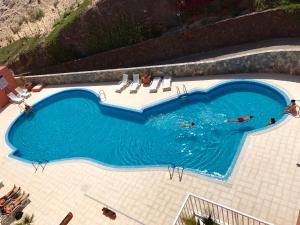 A piscina localizada em Residencial Playa Paraiso ou nos arredores