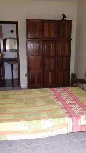 Een bed of bedden in een kamer bij Apartamento em Piúma-ES
