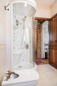 a bathroom with a shower and a sink at Hostal Restaurante Rijujama in Matillas