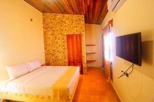 TV a/nebo společenská místnost v ubytování Hotel Mirna & OCT