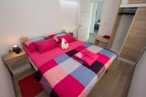 Postel nebo postele na pokoji v ubytování Apartment Krista Tinjan