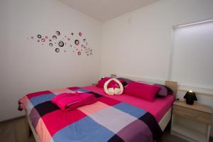 Postel nebo postele na pokoji v ubytování Apartment Krista Tinjan
