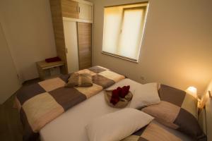 Postel nebo postele na pokoji v ubytování Apartment Krista Tinjan