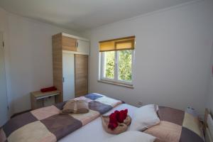 Postel nebo postele na pokoji v ubytování Apartment Krista Tinjan