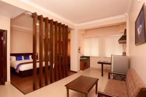 Rúm í herbergi á Hotel Mudita