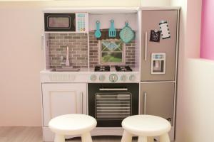 Een keuken of kitchenette bij Childlike B&B