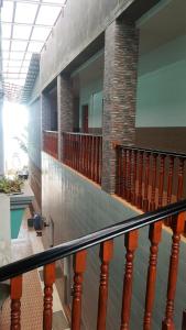a view of a staircase in a building at Nasional Hotel in Gunungsitoli