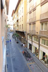 a street with bikes parked on the side of buildings at Piccolo Borgo Antico in Florence