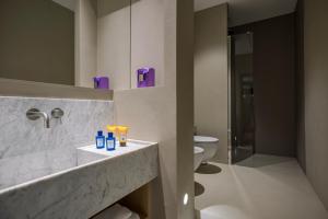 Kúpeľňa v ubytovaní G55 Design Hotel