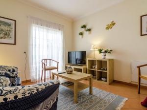 Телевізор і / або розважальний центр в This warm and comfortable apartment