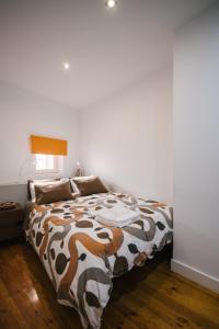 Ένα ή περισσότερα κρεβάτια σε δωμάτιο στο Castelo Picao