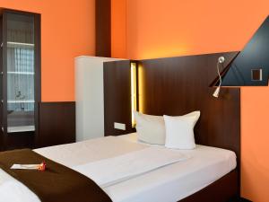 Ein Bett oder Betten in einem Zimmer der Unterkunft Best Western Plus Konrad Zuse Hotel