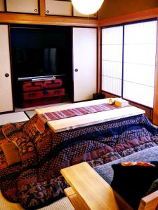 Llit o llits en una habitació de K's Villa Hida-an