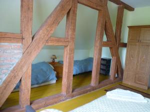 Giường trong phòng chung tại Sloneczna Weranda