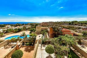 Πισίνα στο ή κοντά στο New townhouse in El Duque Joyas