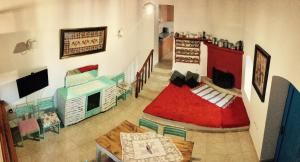 A television and/or entertainment centre at Mariza's traditional house 1900
