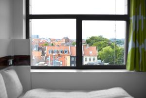 Voodi või voodid majutusasutuse Wakeup - Aarhus toas