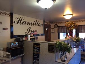 a restaurant with a sign that reads hamilton istg istg at Hamilton Inn Sturbridge in Sturbridge