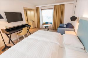 Postel nebo postele na pokoji v ubytování Boutique-Hotel Zur alten Post
