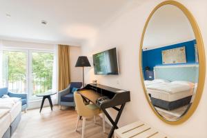Postel nebo postele na pokoji v ubytování Boutique-Hotel Zur alten Post