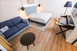Postel nebo postele na pokoji v ubytování Boutique-Hotel Zur alten Post