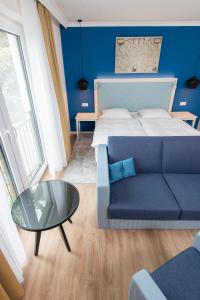 Postel nebo postele na pokoji v ubytování Boutique-Hotel Zur alten Post