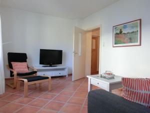 TV a/nebo společenská místnost v ubytování Ferienwohnung Arenz