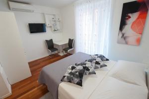 Postel nebo postele na pokoji v ubytování Room MARE