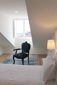 Кровать или кровати в номере Burgus Tribute & Design Hotel