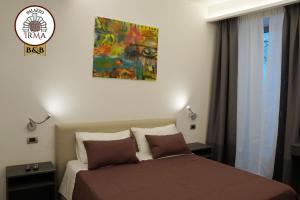 Postel nebo postele na pokoji v ubytování Palazzo IrMa - Hotel - B&B Luxury