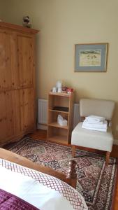 Postel nebo postele na pokoji v ubytování Elderberry B&B