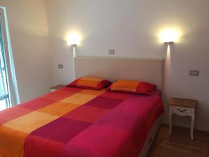 Postel nebo postele na pokoji v ubytování TIN House