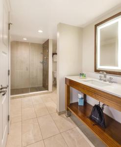 a bathroom with a sink and a shower at Margaritaville Vacation Club by Wyndham - St Thomas in Frydendal